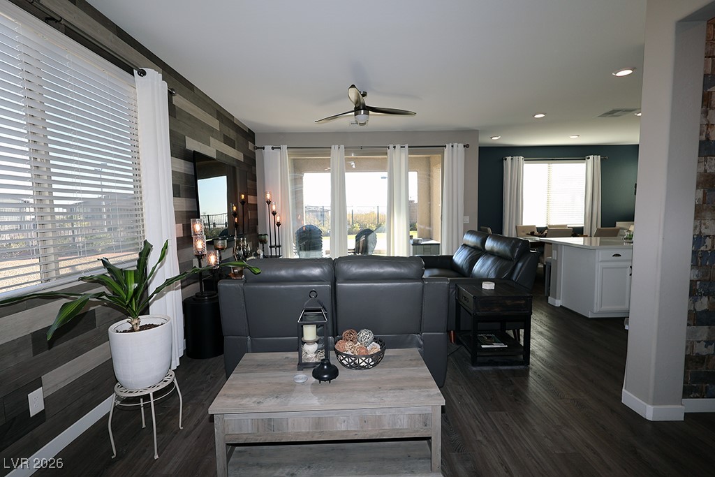 764 Rogue Wave Street Las Vegas, NV 89138 - Photo 11 of 36 Living room featuring dark wood-type flooring, a ceiling fan, and recessed lighting