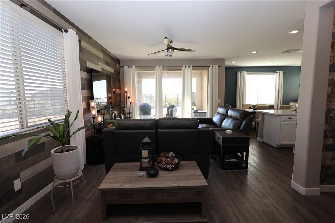 764 Rogue Wave Street Las Vegas, NV 89138 - Photo 12 of 36 Living room featuring a ceiling fan, dark wood finished floors, and recessed lighting