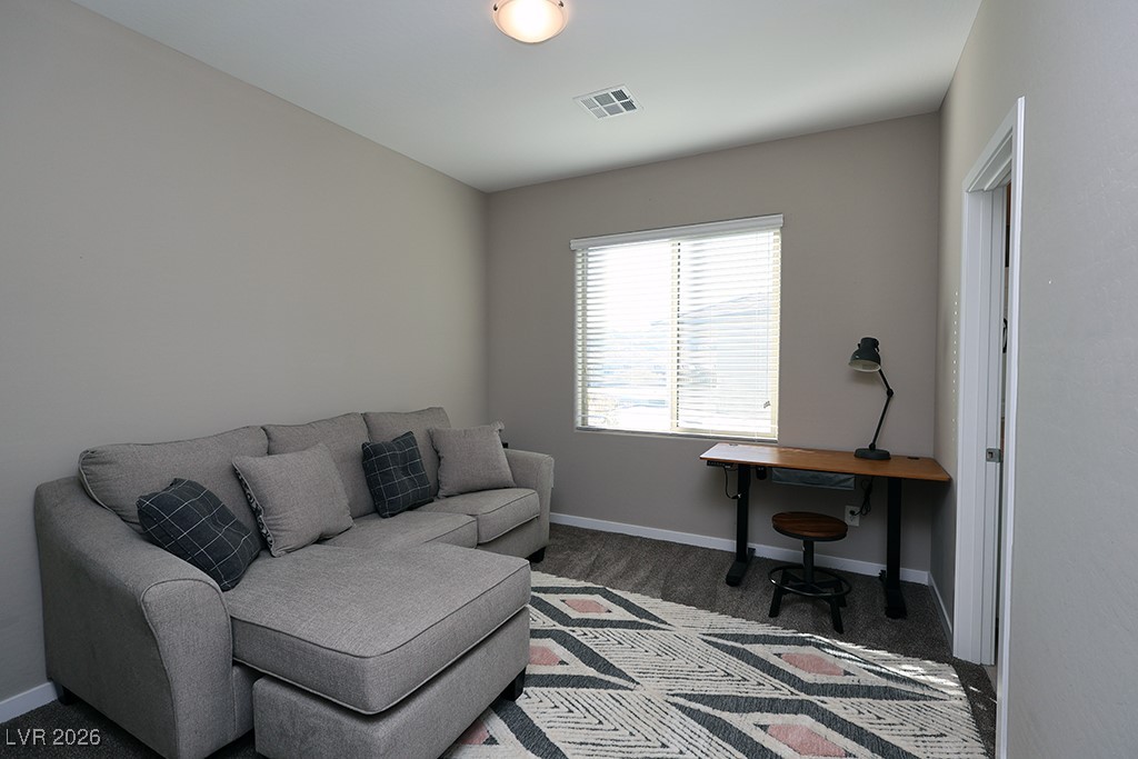 764 Rogue Wave Street Las Vegas, NV 89138 - Photo 16 of 36 Living room with baseboards