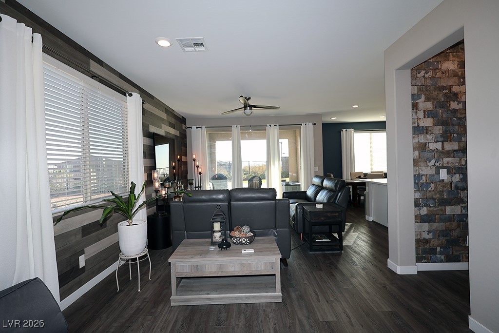 764 Rogue Wave Street Las Vegas, NV 89138 - Photo 28 of 36 Living area with a ceiling fan, dark wood-type flooring, and recessed lighting