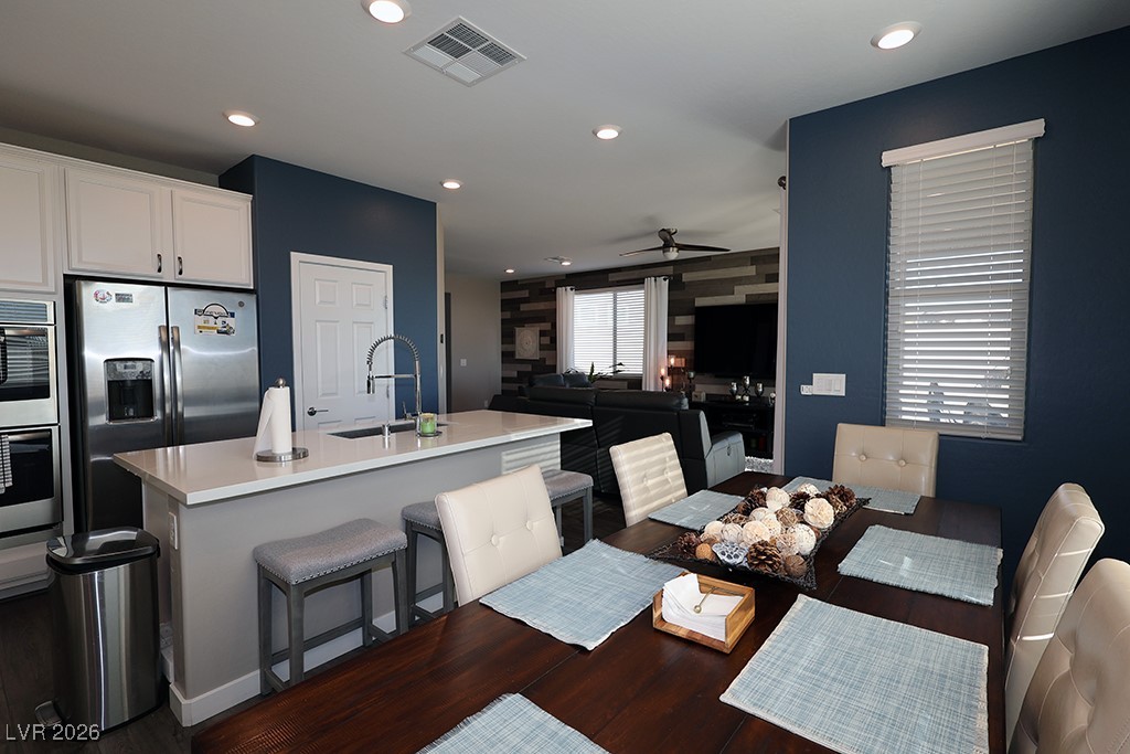 764 Rogue Wave Street Las Vegas, NV 89138 - Photo 6 of 36 Dining room with recessed lighting, a ceiling fan, and dark wood finished floors