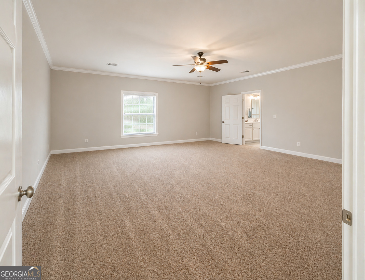 1024 Holly Estates Road Tarrytown, GA 30470 - Photo 4 of 15 a view of an empty room with a window
