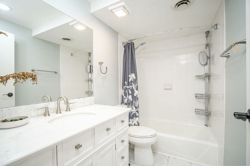 58 Williamsburg Drive, Unit 58 Springfield, MA 01108 - Photo 11 of 15 a bathroom with a sink a toilet and shower