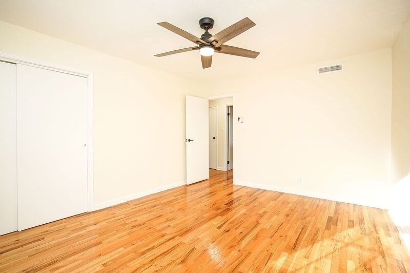 58 Williamsburg Drive, Unit 58 Springfield, MA 01108 - Photo 14 of 15 a view of a big room with wooden floor