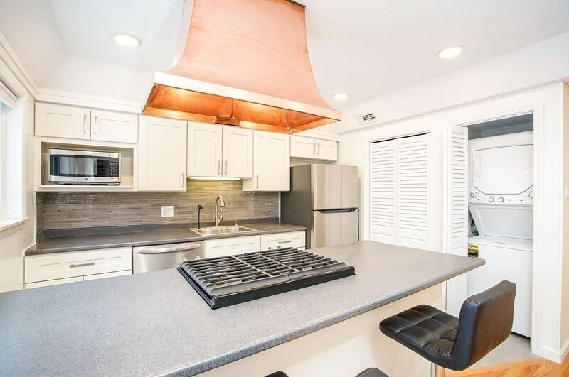 58 Williamsburg Drive, Unit 58 Springfield, MA 01108 - Photo 8 of 15 a kitchen with stainless steel appliances granite countertop a sink stove and refrigerator