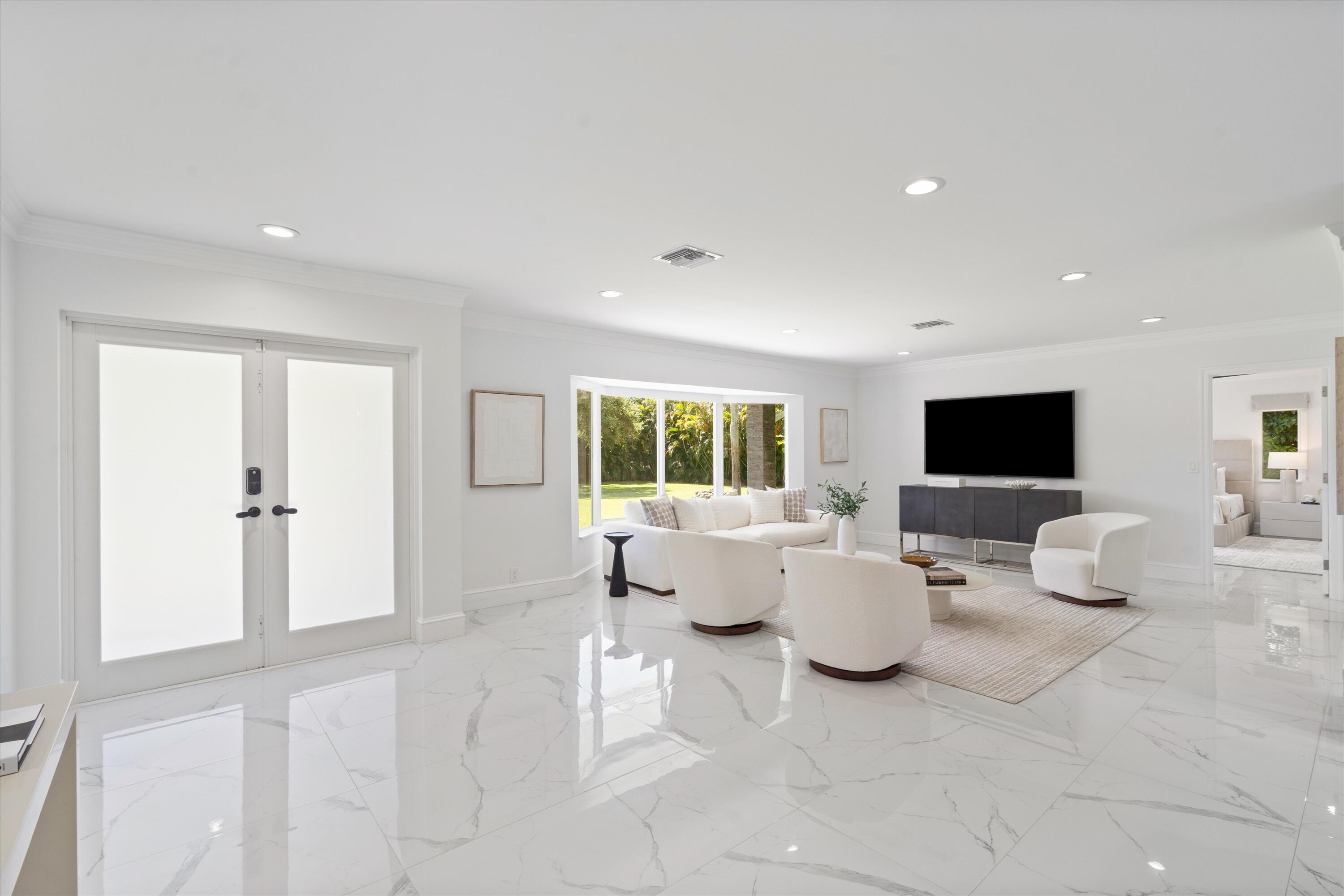 7647 Lawrence Road Boynton Beach, FL 33436 - Photo 8 of 54 Entry into Family Room