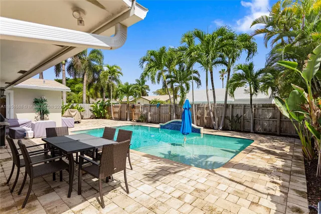 a view of a table and chairs in patio