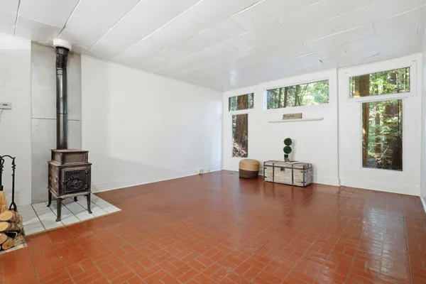 a view of livingroom with furniture and a window