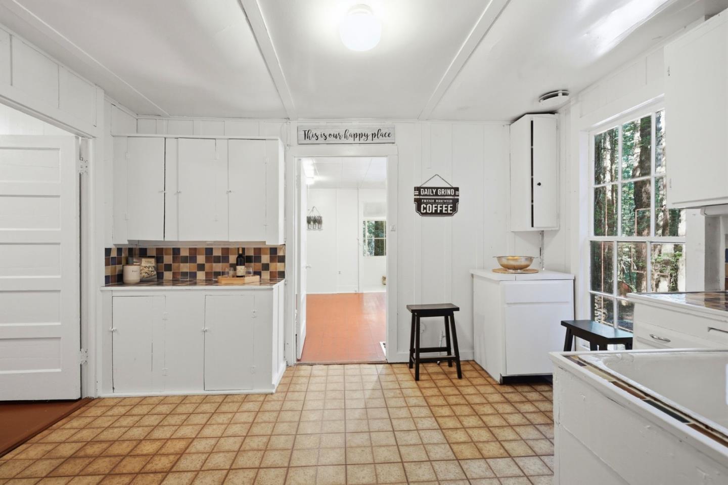 155 Native Sons Road Woodside, CA 94062 - Photo 18 of 42 a room with a white cabinets and white appliances