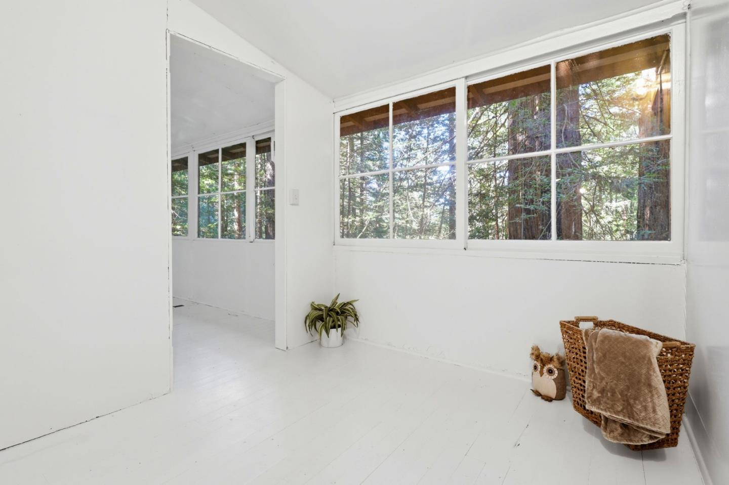 155 Native Sons Road Woodside, CA 94062 - Photo 22 of 42 a view of room with furniture and windows