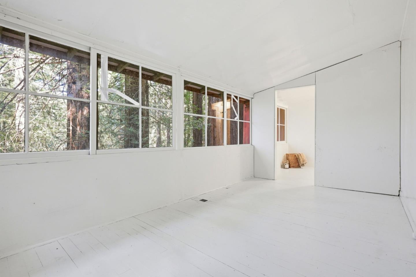 155 Native Sons Road Woodside, CA 94062 - Photo 24 of 42 a view of an empty room with a window
