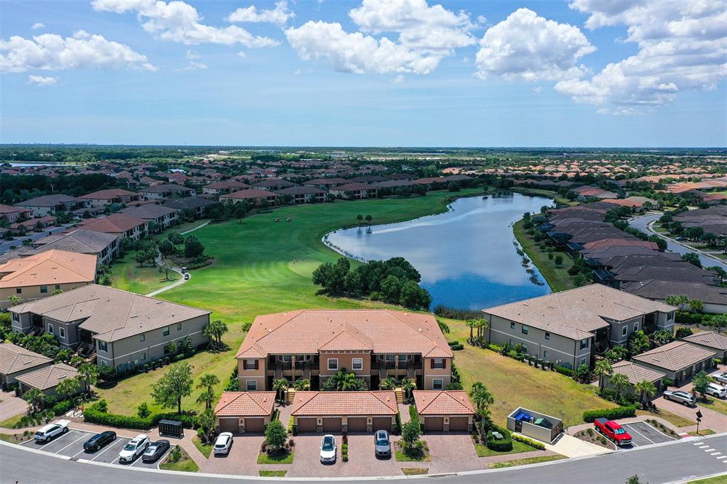 an aerial view of a houses and an outdoor space