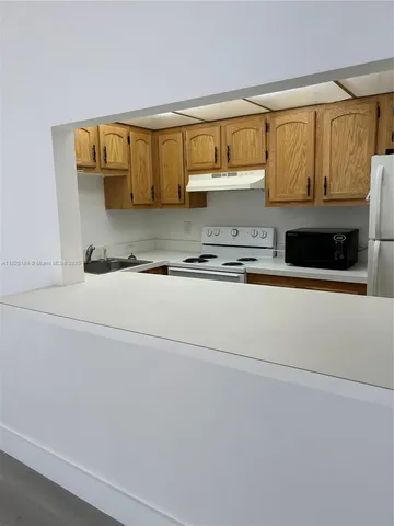 $1,400 | 4154 Inverrary Drive, Unit 205, Lauderhill, FL 33319