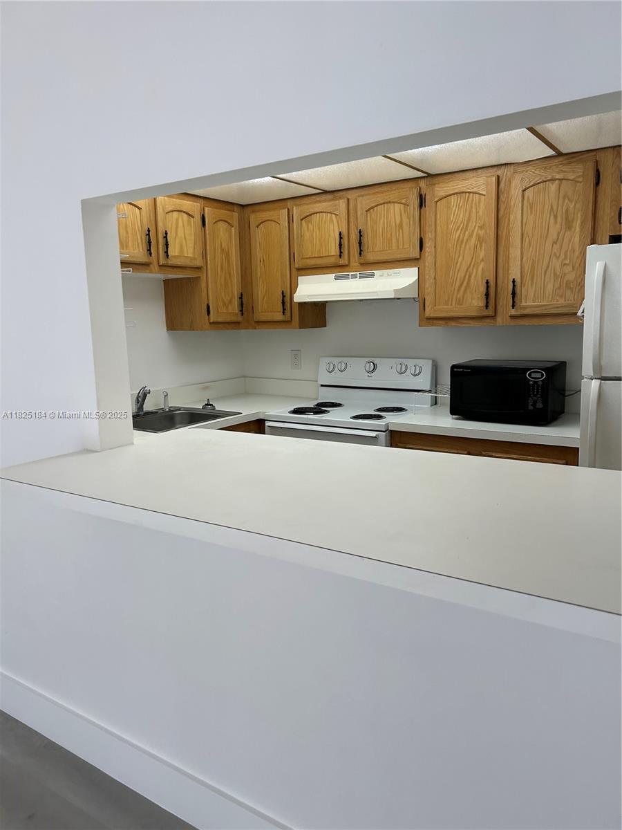 4154 Inverrary Drive, Unit 205 Lauderhill, FL 33319 - Photo 6 of 17