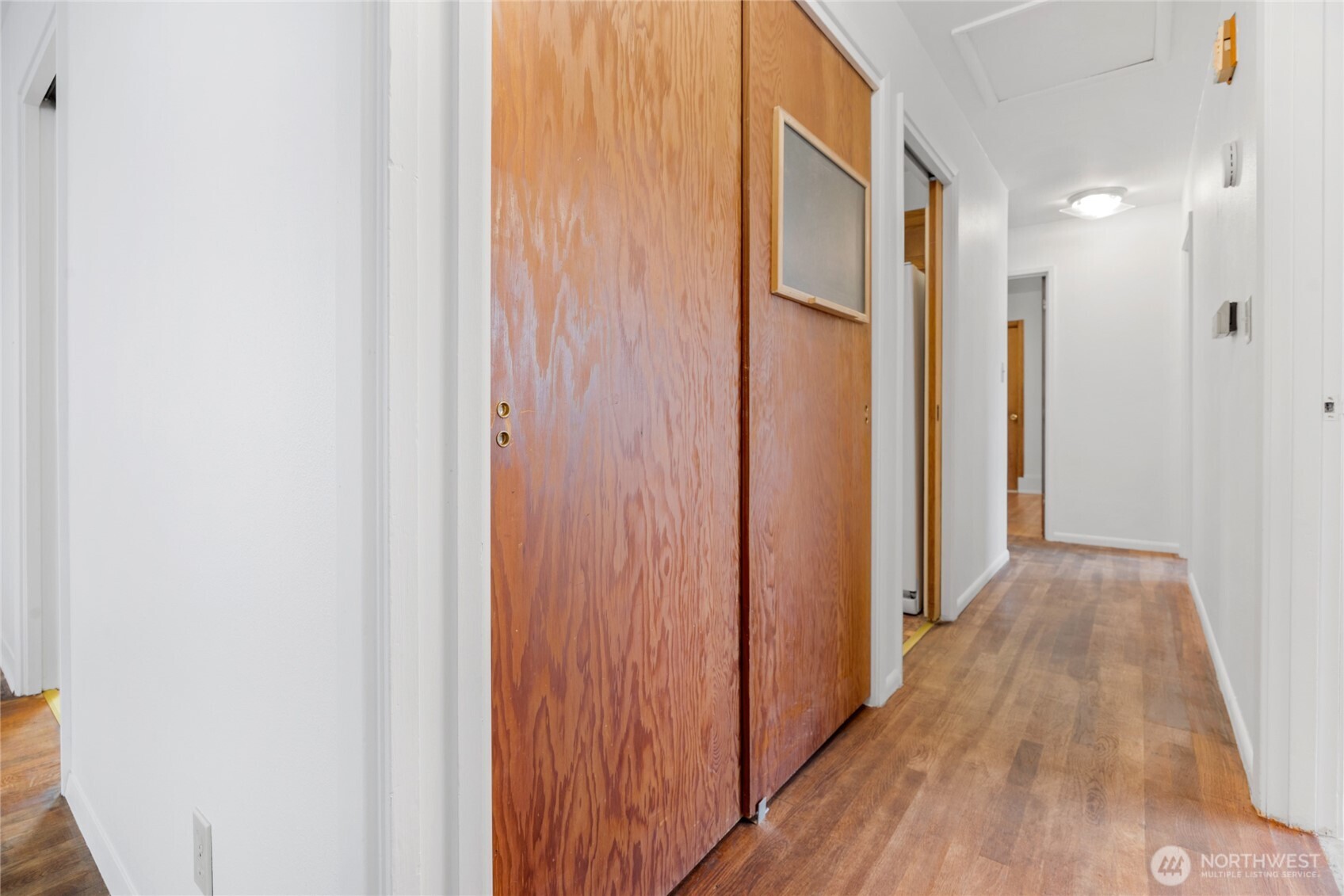 611 3rd Avenue North Edmonds, WA 98020 - Photo 14 of 28 a view of a hallway with wooden floor
