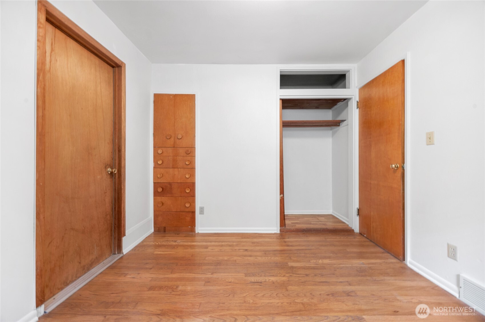 611 3rd Avenue North Edmonds, WA 98020 - Photo 17 of 28 a view of an empty room with wooden floor