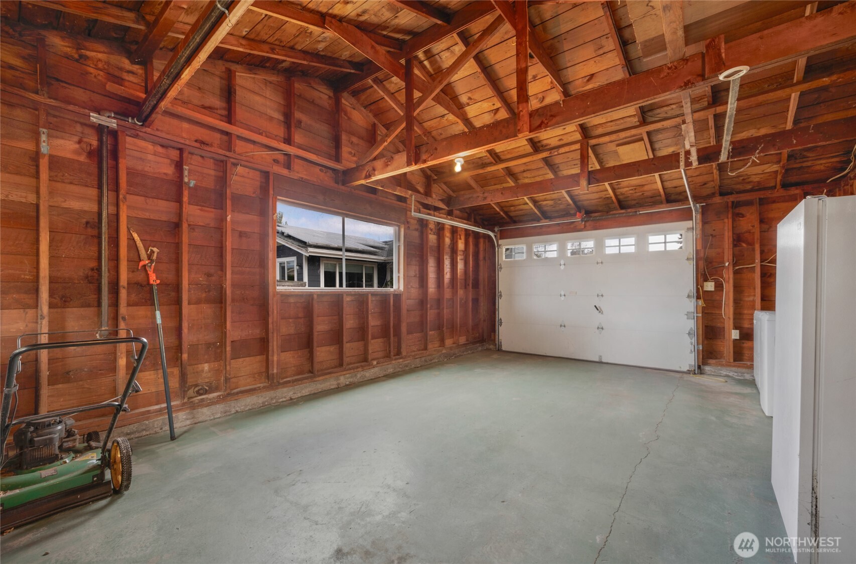 611 3rd Avenue North Edmonds, WA 98020 - Photo 20 of 28 a view of an empty room with wooden walls