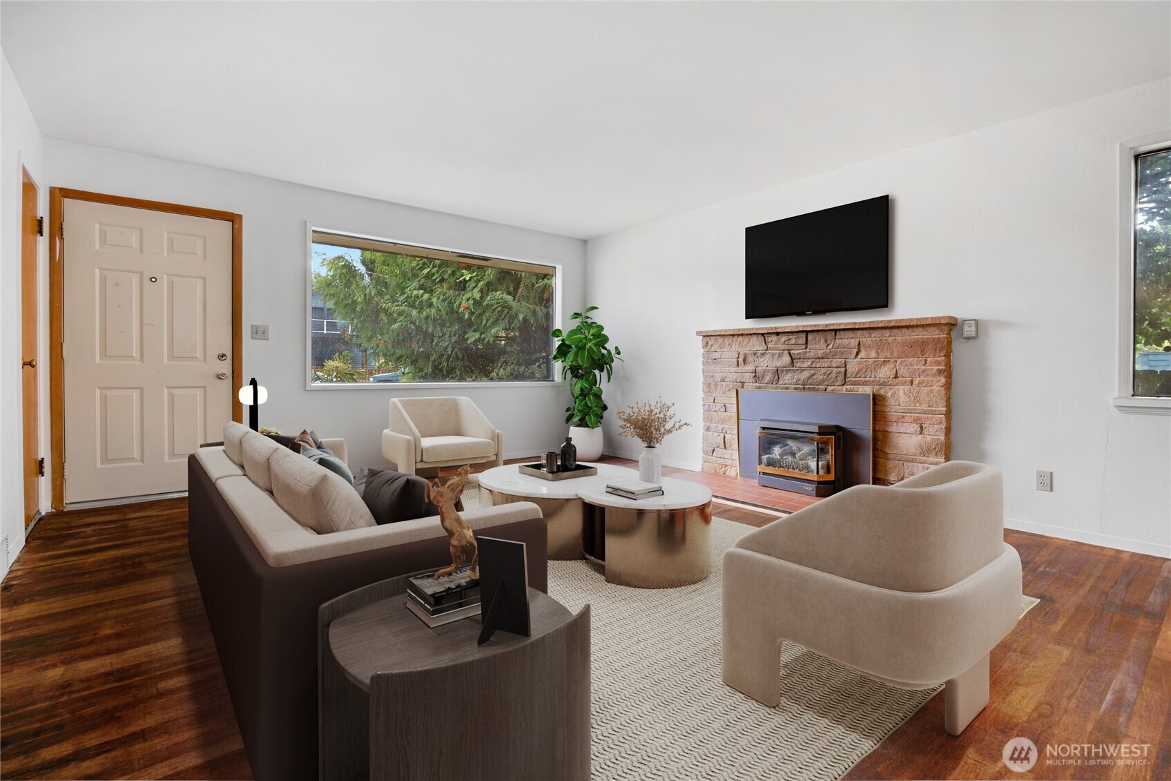 611 3rd Avenue North Edmonds, WA 98020 - Photo 3 of 28 a living room with furniture fireplace and a flat screen tv