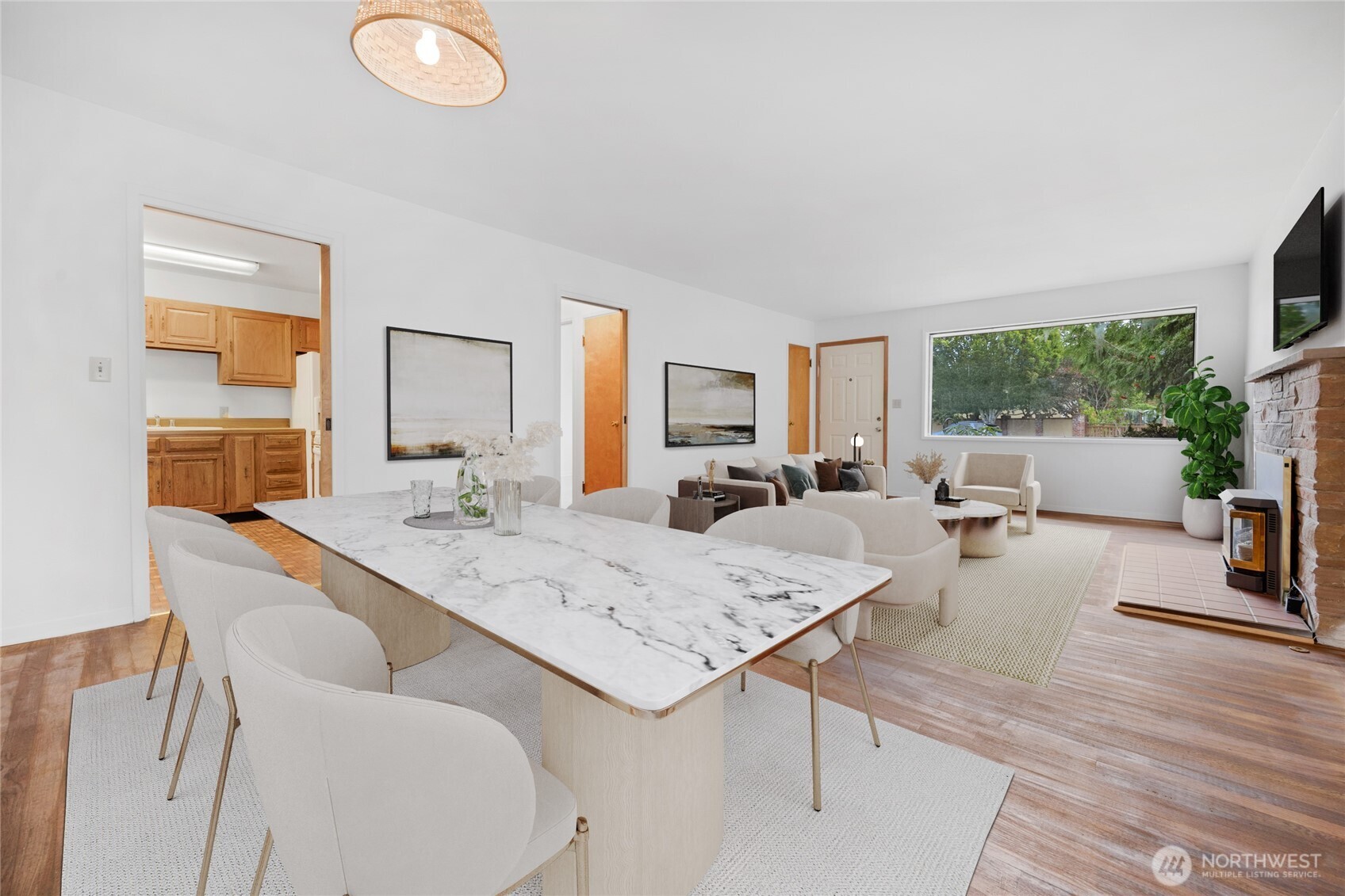 611 3rd Avenue North Edmonds, WA 98020 - Photo 9 of 28 a view of a dining room kitchen and hall with wooden floor