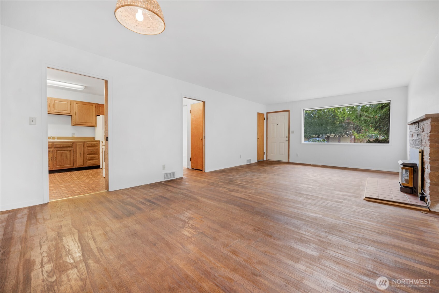 611 3rd Avenue North Edmonds, WA 98020 - Photo 10 of 28 a view of empty room with wooden floor and fan