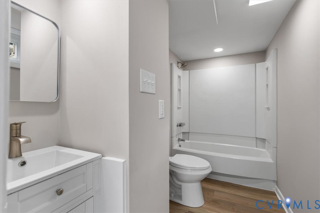 3308 Sylvania Road Chester, VA 23831 - Photo 40 of 55 Contemporary bathroom featuring a white vanity wit