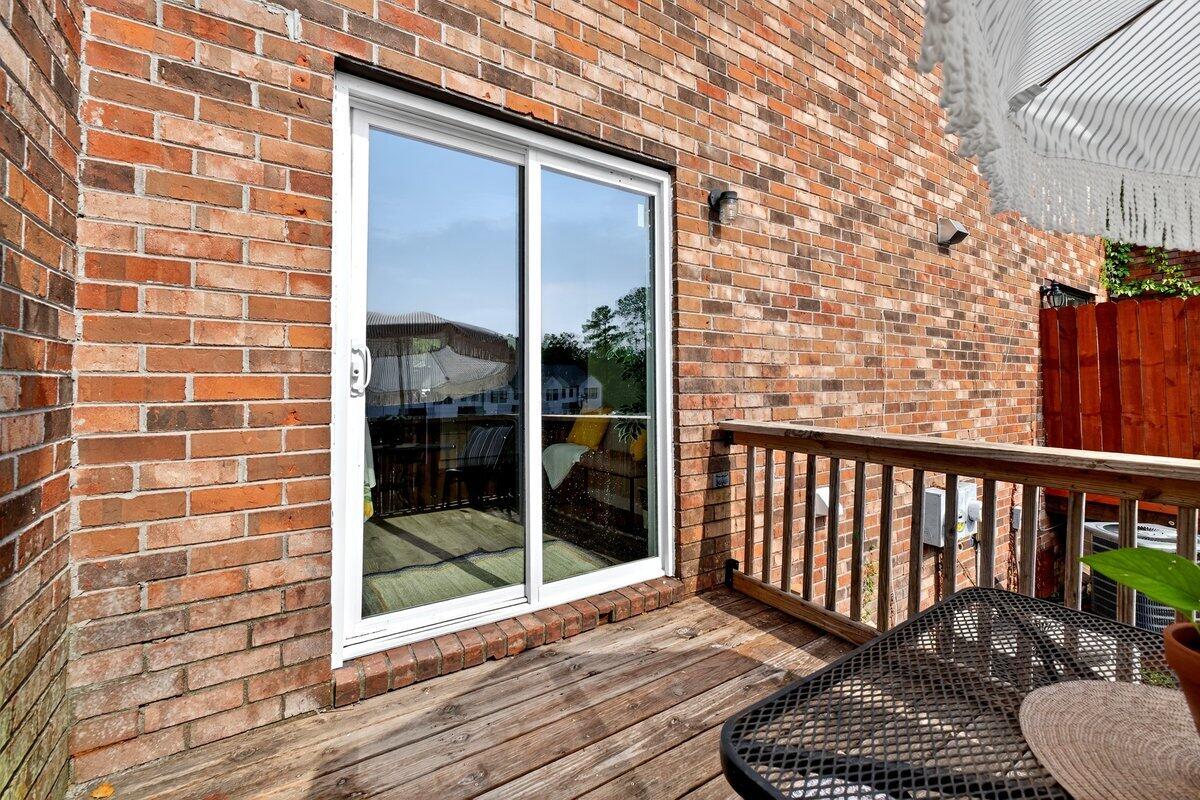 154 Rahway Road, Unit H Goose Creek, SC 29445 - Photo 28 of 34 back porch sliding glass doors