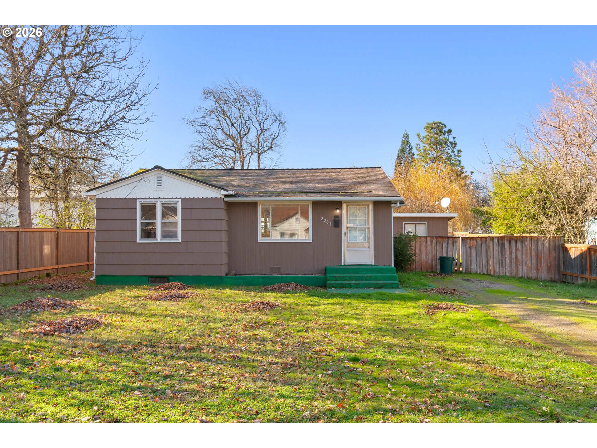 a view of a backyard with a garden