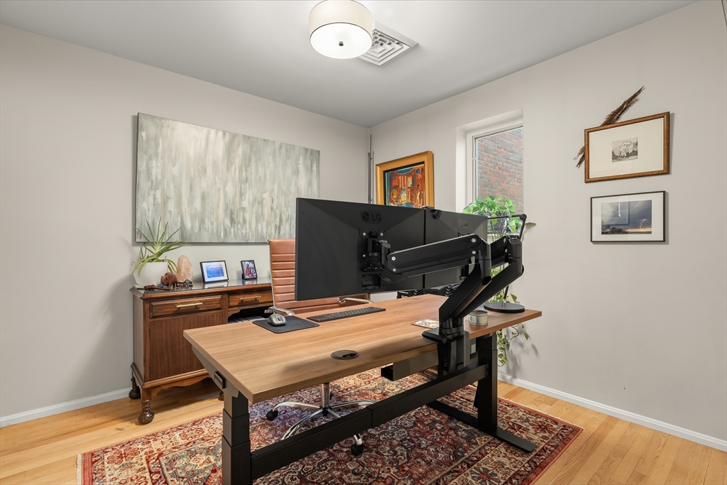 350 North Street, Unit 200 Boston, MA 02113 - Photo 12 of 22 a view of a workspace with furniture