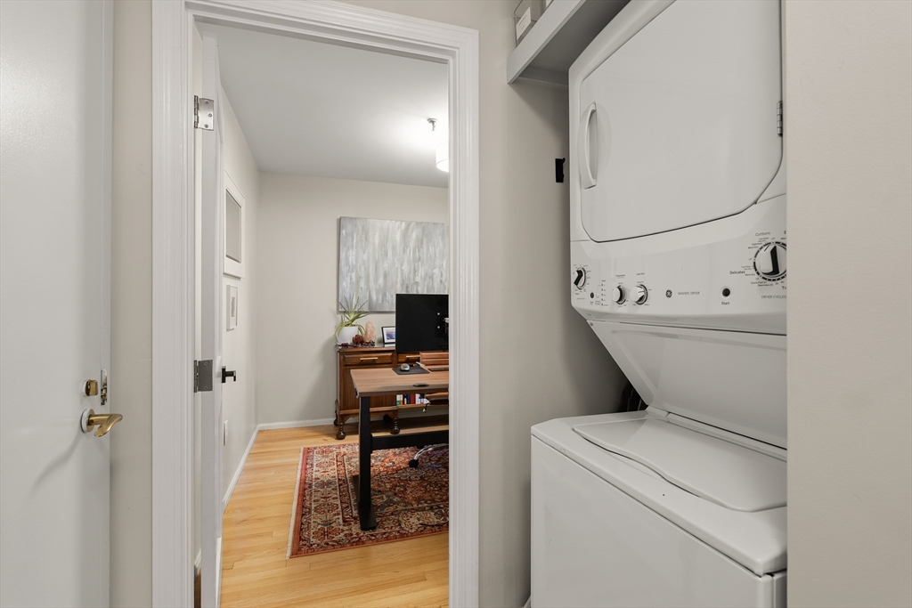 350 North Street, Unit 200 Boston, MA 02113 - Photo 17 of 22 a view of washer and dryer with bathroom in the background