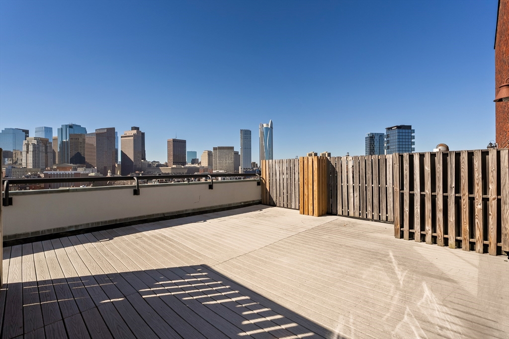 350 North Street, Unit 200 Boston, MA 02113 - Photo 21 of 22 a terrace with a bench and trees