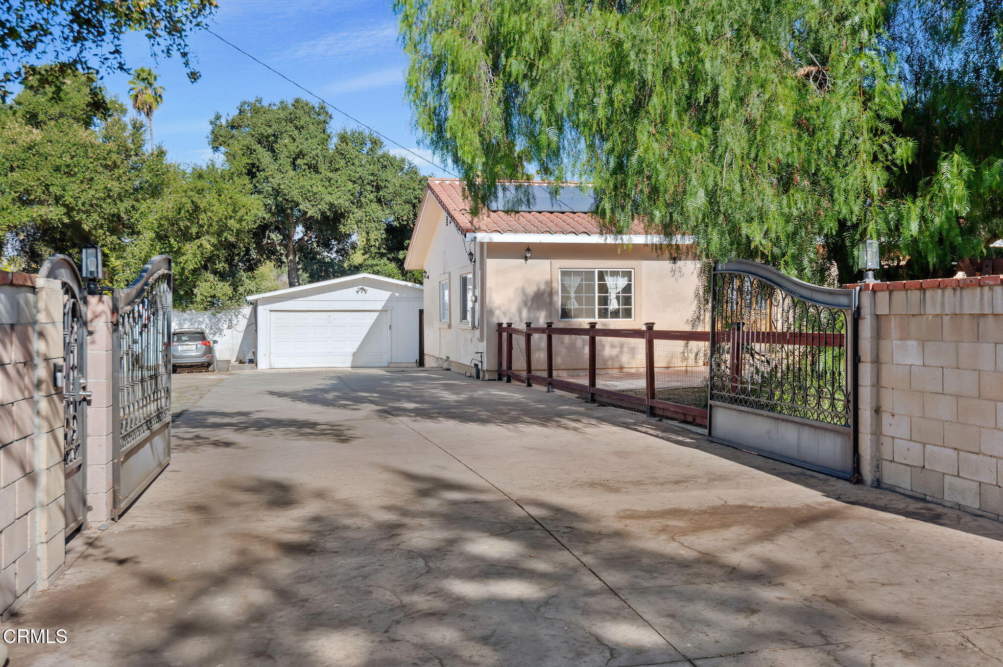 717 West Villanova Road Ojai, CA 93023 - Photo 3 of 33 a view of a front of house with a yard and fence