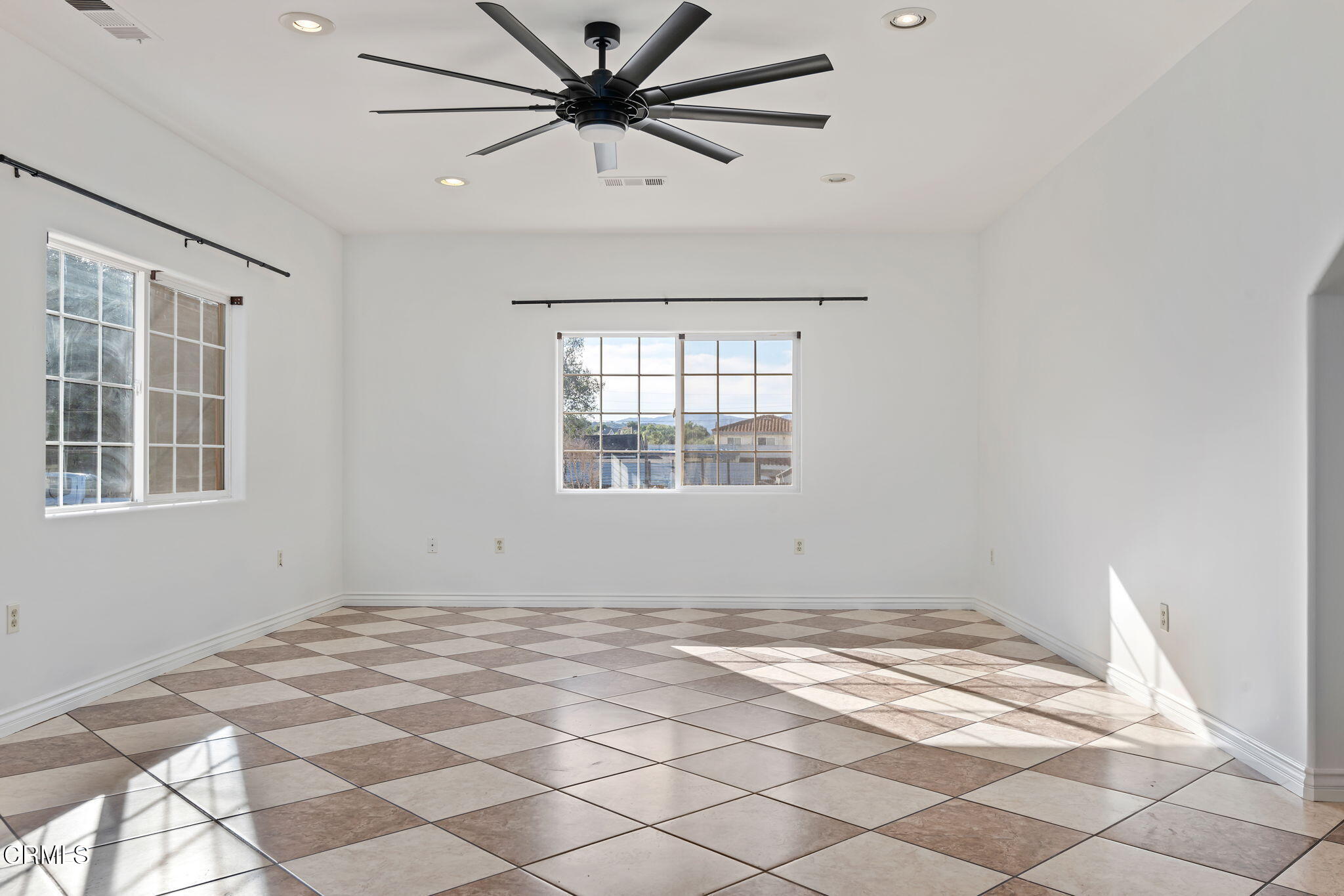 717 West Villanova Road Ojai, CA 93023 - Photo 7 of 33 a view of a big room with wooden floor and windows in a room