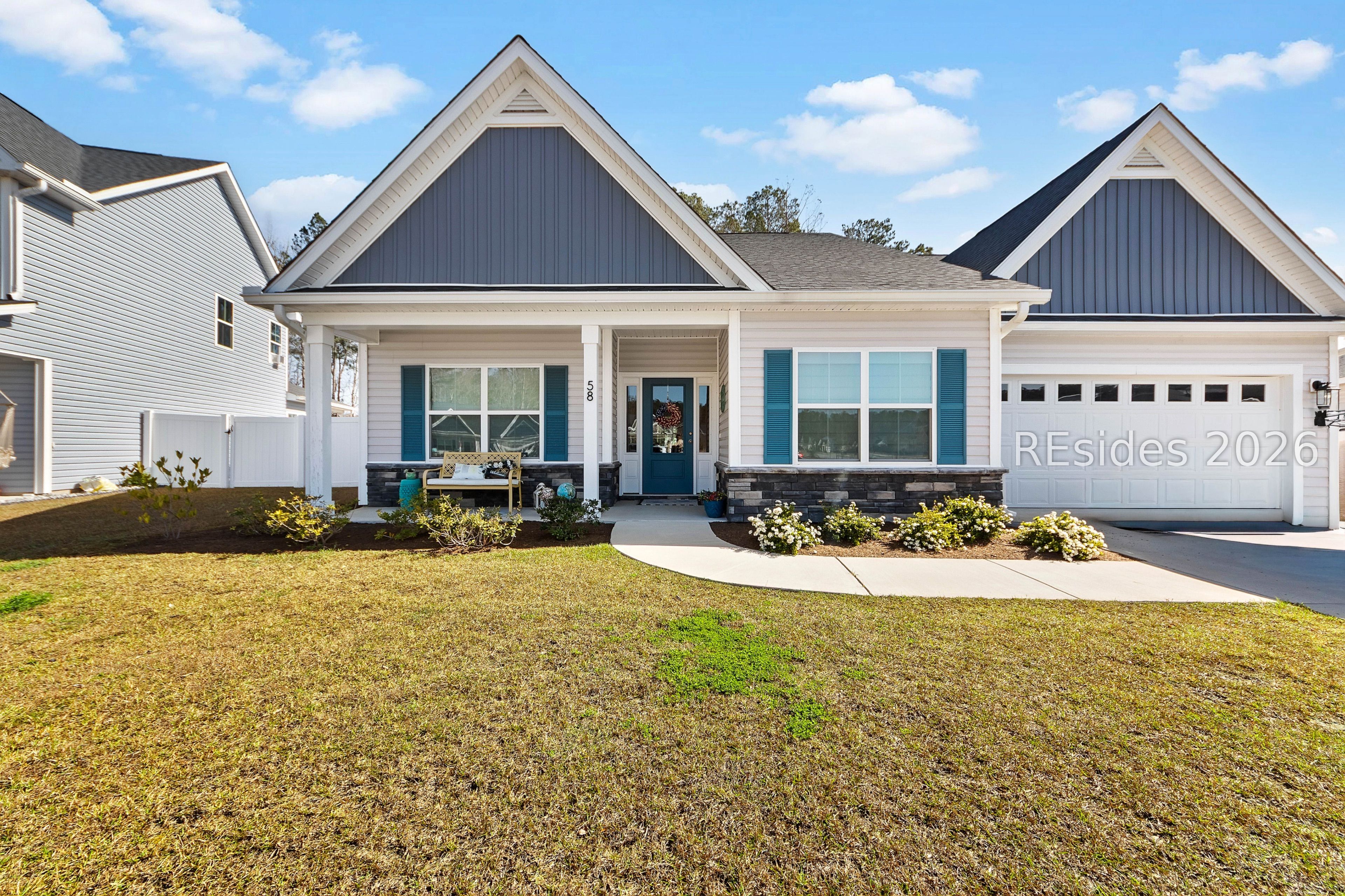 Welcoming front porch with stone front