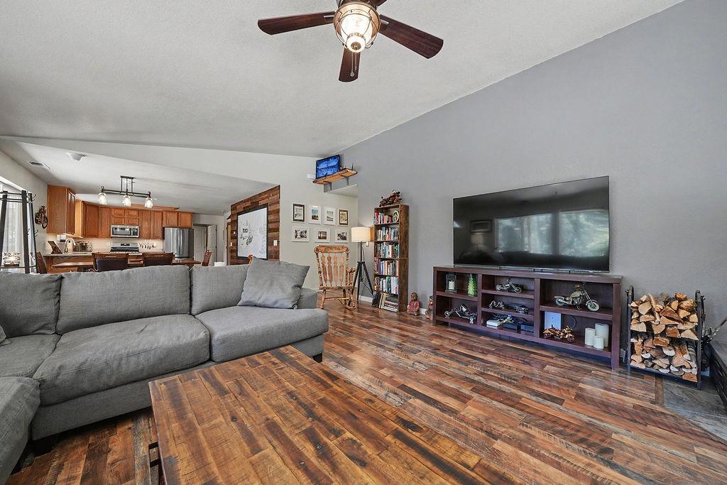 26845 Spring Court Pioneer, CA 95666 - Photo 23 of 89 a living room with furniture and a flat screen tv