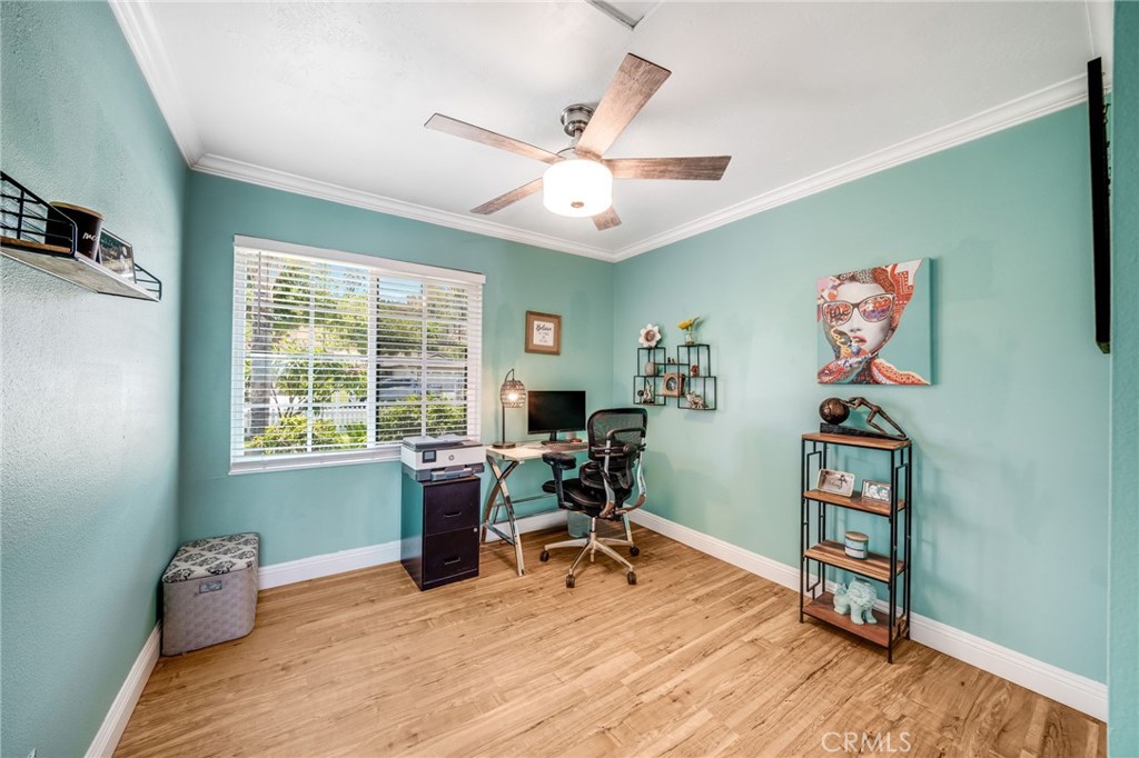 1935 Adobe Avenue Corona, CA 92882 - Photo 18 of 45 a workspace with furniture hardwood and a window
