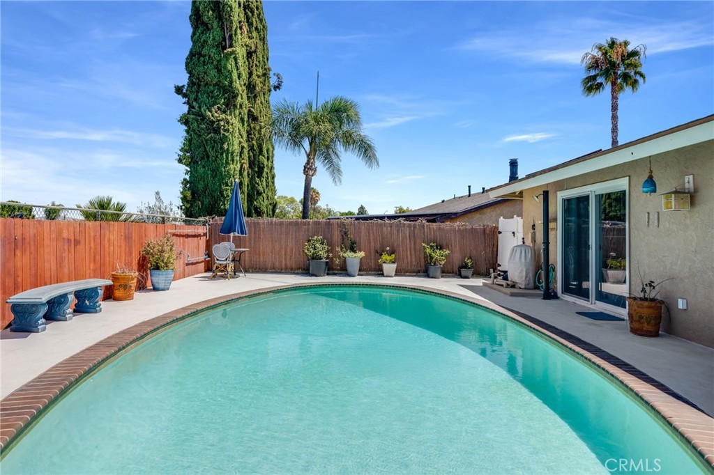 1935 Adobe Avenue Corona, CA 92882 - Photo 28 of 45 a view of a house with swimming pool and furniture