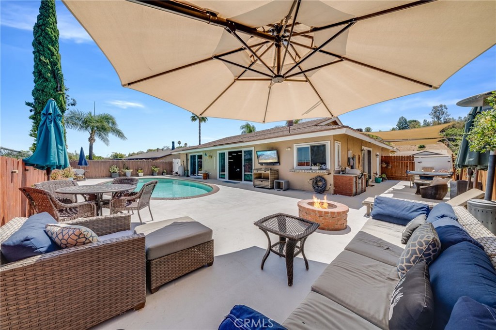 1935 Adobe Avenue Corona, CA 92882 - Photo 30 of 45 a outdoor space with patio the couches and pool