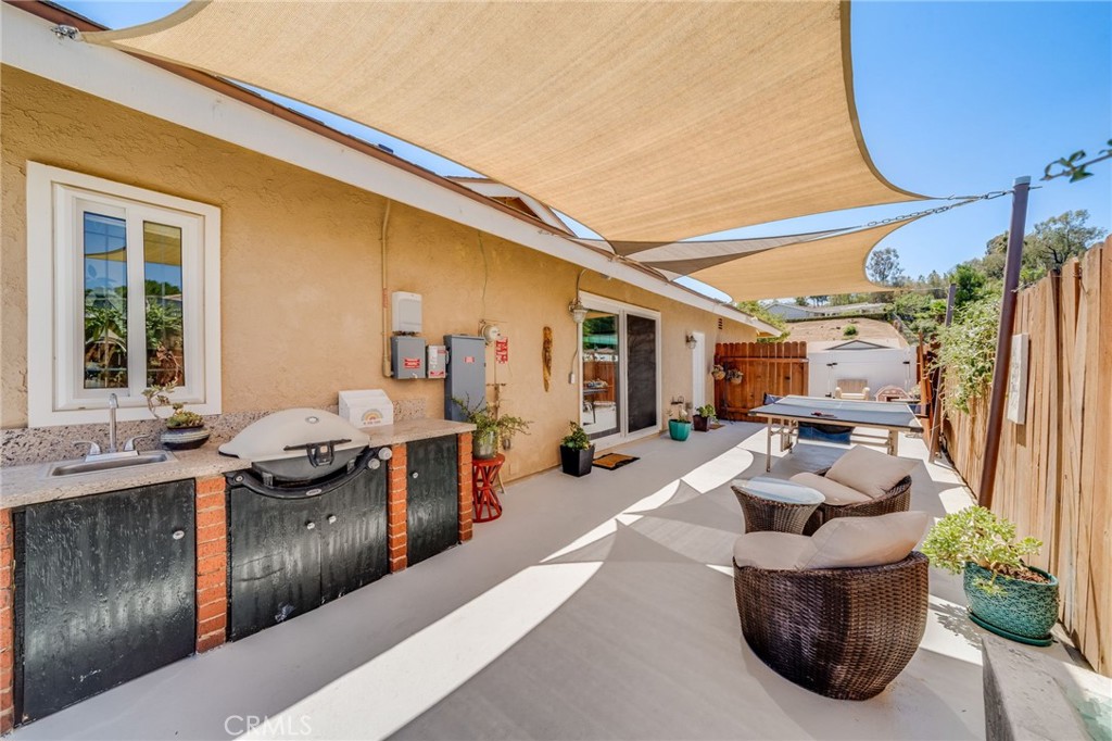 1935 Adobe Avenue Corona, CA 92882 - Photo 32 of 45 a living room with furniture and a window