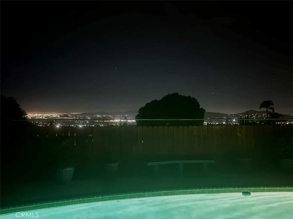 1935 Adobe Avenue Corona, CA 92882 - Photo 35 of 45 a view of a lake from a yard