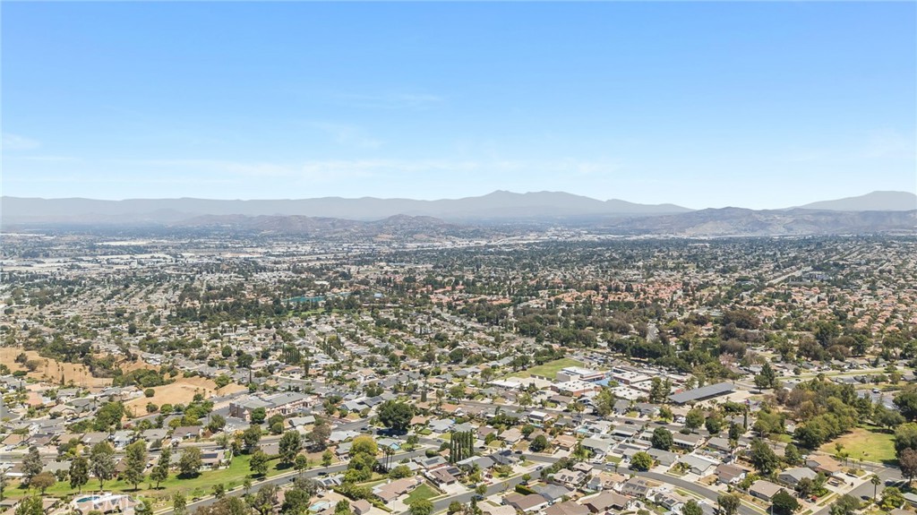 1935 Adobe Avenue Corona, CA 92882 - Photo 44 of 45 an aerial view of house with yard and mountain view in back