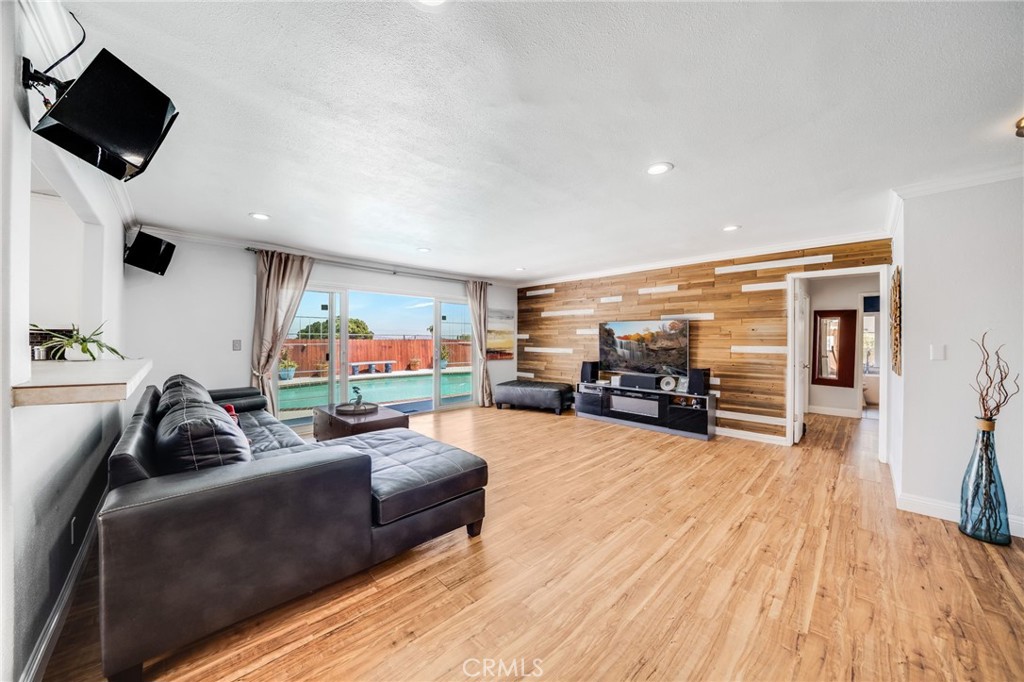 1935 Adobe Avenue Corona, CA 92882 - Photo 7 of 45 a living room with furniture and a flat screen tv
