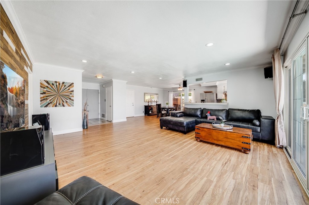 1935 Adobe Avenue Corona, CA 92882 - Photo 9 of 45 a living room with furniture and a wooden floor