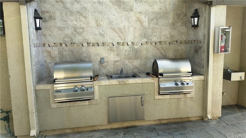 291 Chaumont Circle Lake Forest, CA 92610 - Photo 2 of 13 a kitchen with a stove and a refrigerator