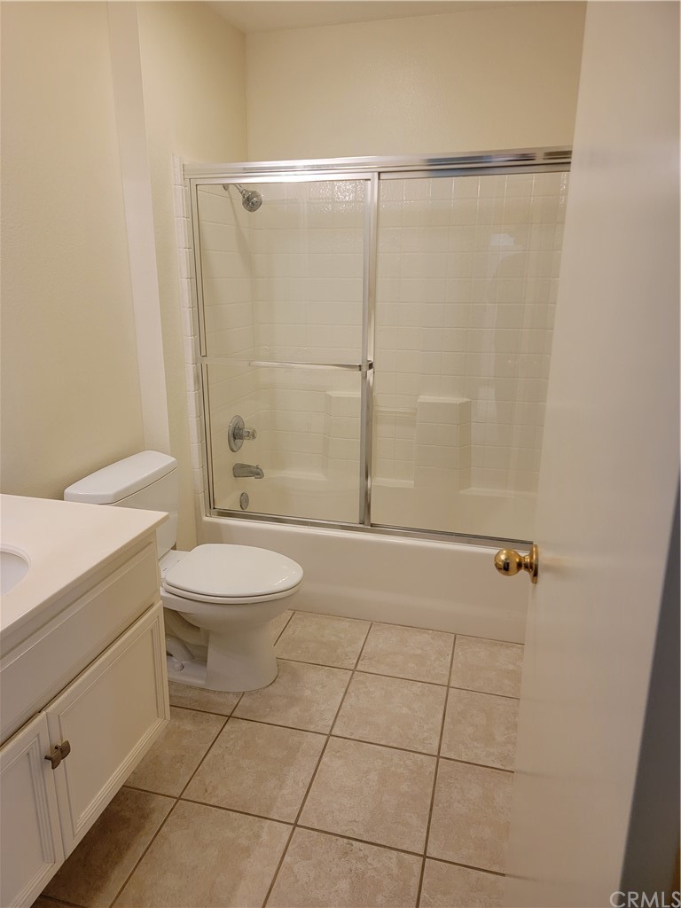 291 Chaumont Circle Lake Forest, CA 92610 - Photo 9 of 13 a bathroom with a shower a toilet and a sink