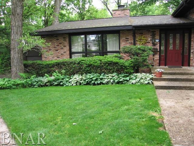 5801 Viking Road Clinton, IL 61727 - Photo 2 of 27 a front view of a house with garden