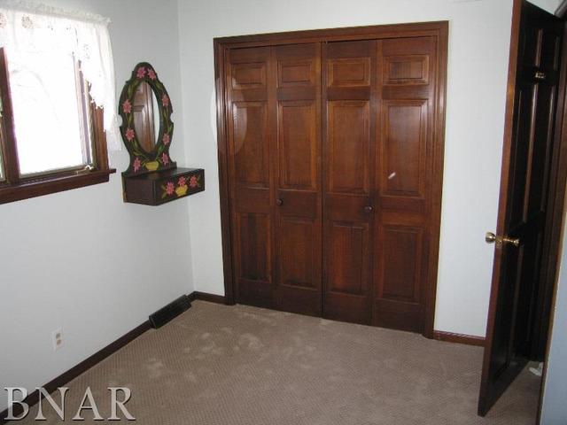 5801 Viking Road Clinton, IL 61727 - Photo 24 of 27 a view of a livingroom with a wooden door