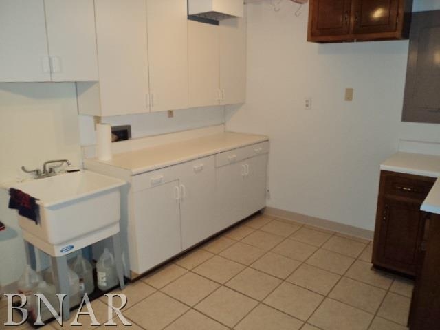 5801 Viking Road Clinton, IL 61727 - Photo 27 of 27 a utility room with cabinets