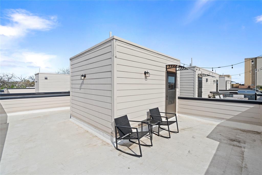 1804 Ripley Street, Unit 105 Dallas, TX 75204 - Photo 19 of 25 a view of a terrace with seating space