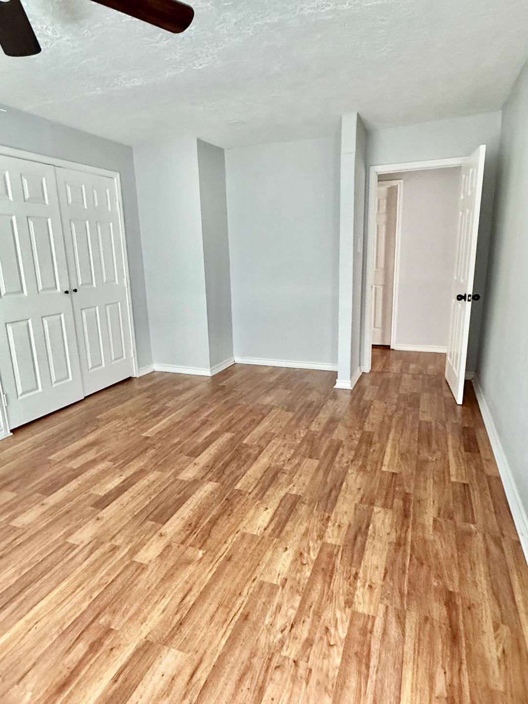 306 Rustic Drive Pasadena, TX 77502 - Photo 15 of 28 a view of empty room with wooden floor