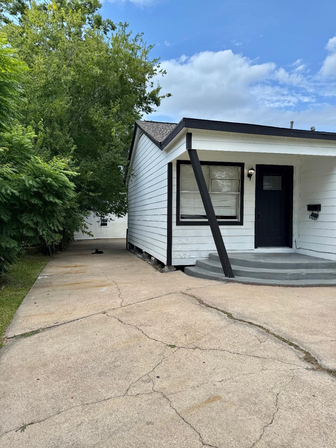 306 Rustic Drive Pasadena, TX 77502 - Photo 2 of 28 a house view with a backyard space